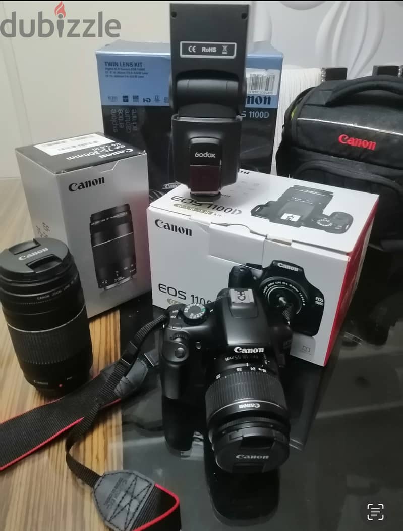 DSLR CAMERA CANON 1100D + Lens 75/300 + Flash light + Canon original b 3