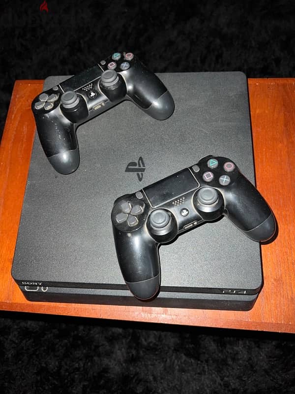 Ps4 Slim 500 Gb + 40 games including fifa 25 + 2 controllers 0