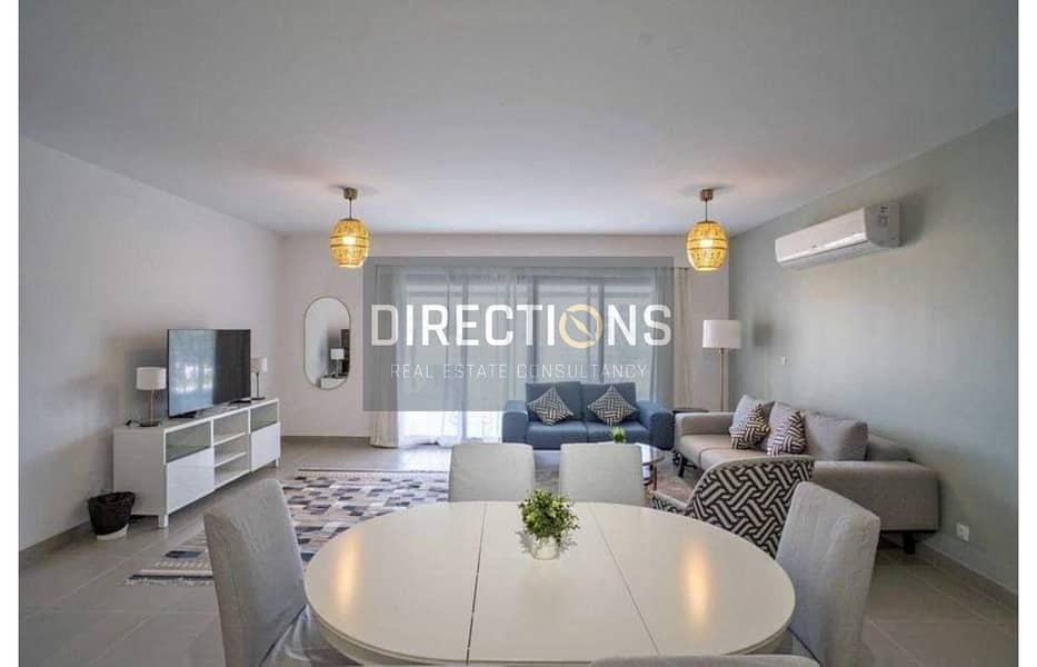 Beside Cairo Gate, apartment + garden for sale, fully finished + ACs in | Village West Dorra | In Sheikh Zayed, in front of Dandy Mall 0