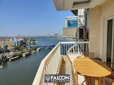 For sale, an apartment with a Nile view in Hilton Towers, immediate delivery, fully finished, hotel finishing (Service By Hilton)