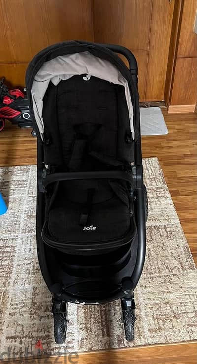 استرولر ماركه جوي joie versatrax  stroller بكل مشتملاتها وضع كارسيت به