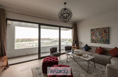 Apartment for sale, ground floor, garden, fully finished, with a distinctive view, immediate receipt, in Al Burouj Compound