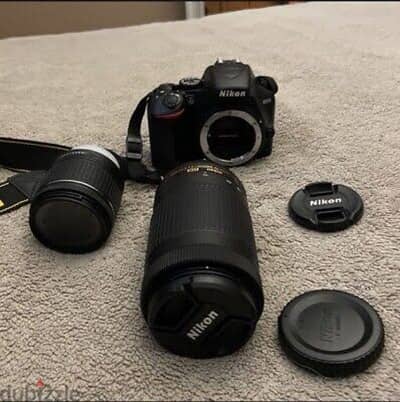 Nikon d5200 + lens 70 - 300 + flash + battery grab + battery charger