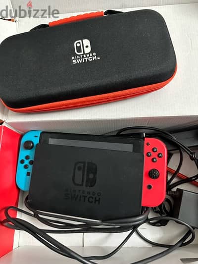 Nintendo Console +Joy-Con Grip + switch portable cover + 20$ Eshop