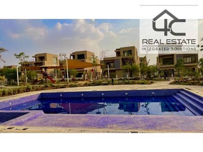 Townhouse Corner for sale with price including maintenance  in the heart of New Cairo with the lowest down payment and installments