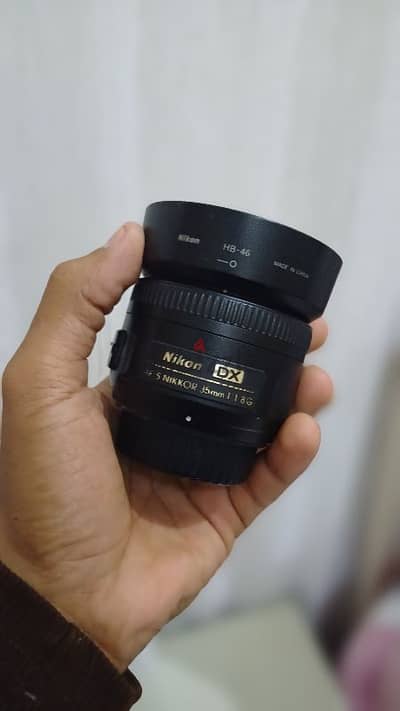 عدسه نيكون 35 DX 1.8