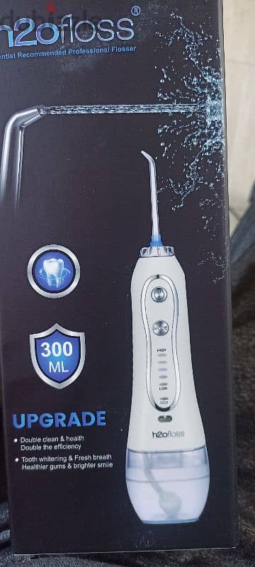 water flosser لتنظيف الأسنان