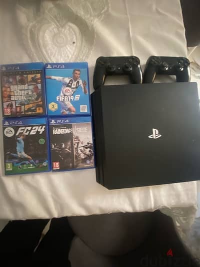 ps4 pro 1tb + 2 controller + fc24 + bo4 and fifa 19 and gta 5 and rs6