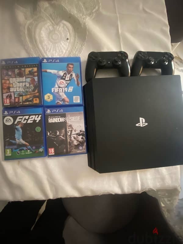 ps4 pro 1tb + 2 controller + fc24 + bo4 and fifa 19 and gta 5 and rs6 0