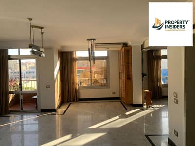 Apartment for rent, new law, in Mohandessin, Wadi El Nil Street