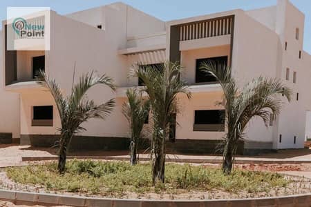 Own a twin house of 433 meters with immediate delivery near the government district in the Administrative Capital, Boardwalk Compound