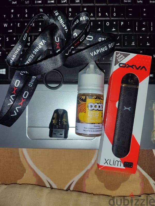 vape pod oxava xlim go اسبشيال اديشن زيرو معاها عليقه و اتنين كارتدج 7