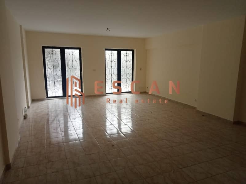 Empty apartment for rent in Al-Rehab 155, close to the city authority and Avenue 0