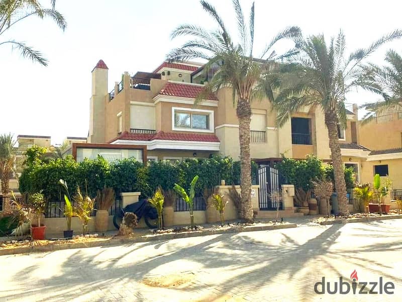 Townhouse villa in New Cairo with a very distinctive division with a garden and a private roof next to Madinaty on the Suez Road 0