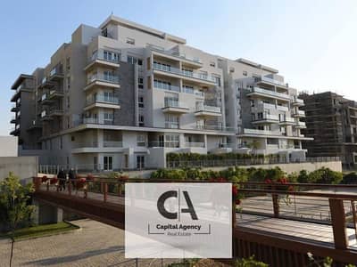 Apartment for sale with garden in Mountain View iCity Ready to move in the heart of Fifth Settlement | View on the lagoon * Mountain View I City