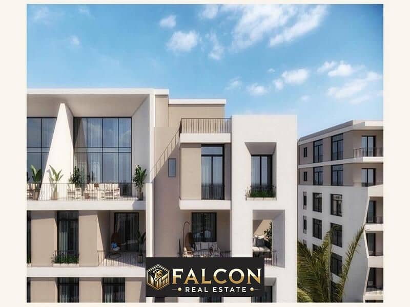 A 3-room apartment for sale with a down payment of 1.6 million in front of Cairo International Airport in Taj City Compound 0