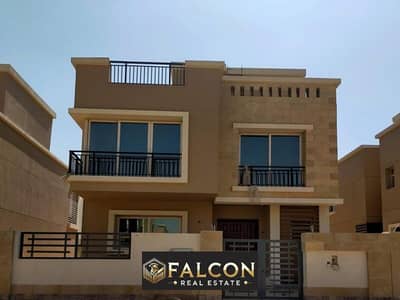 Villa for sale at the lowest price in front of Cairo International Airport with a down payment of 4 million in Taj City, New Cairo