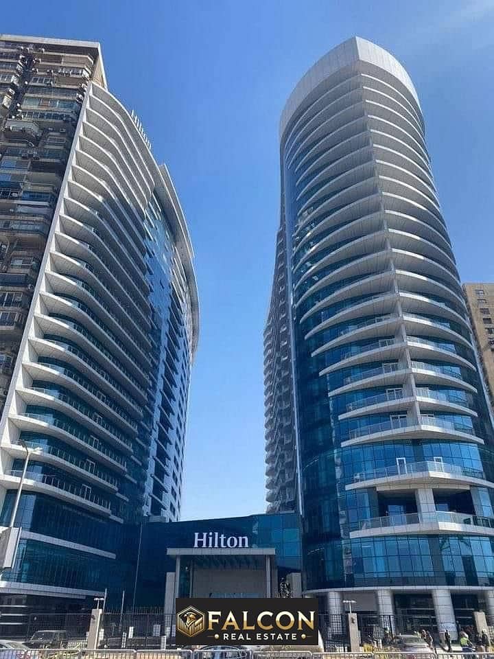 Hilton Hotel Management, ready-to-move-in apartment, fully finished, panoramic view of the Nile, directly on the Nile Pearl Towers 0