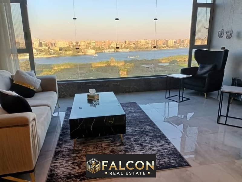 For sale, a fully furnished, Nile-view apartment with a hotel-style finish on the Nile Corniche in Maadi, in the Reve du Nil project. 0