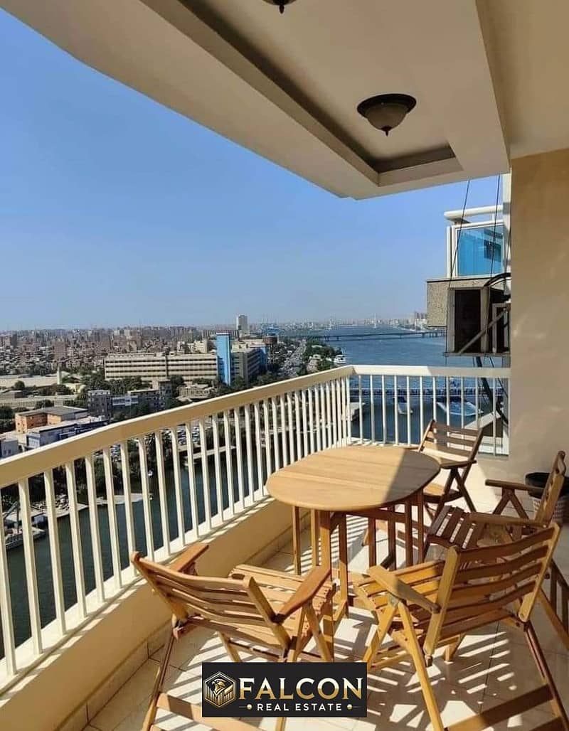 For sale, a furnished hotel apartment with appliances and a kitchen, with a view of the Nile, fully finished, in Maadi, in the Reve du Nil project 0