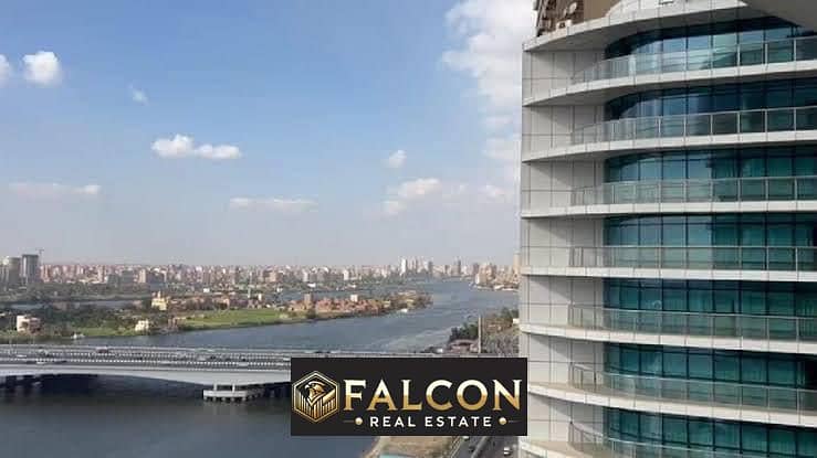 Apartment for sale with the highest investment return, 100% view on the Nile Corniche, ready for inspection and immediate receipt, with complete hotel 0