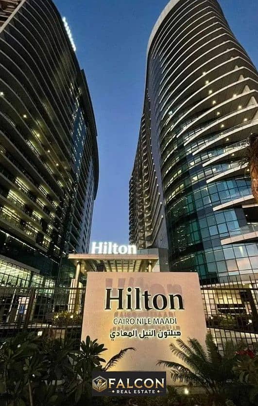 Full Nile view apartment managed by Hilton fully finished with air conditioners for sale in Maadi Nile Pearl Towers 0