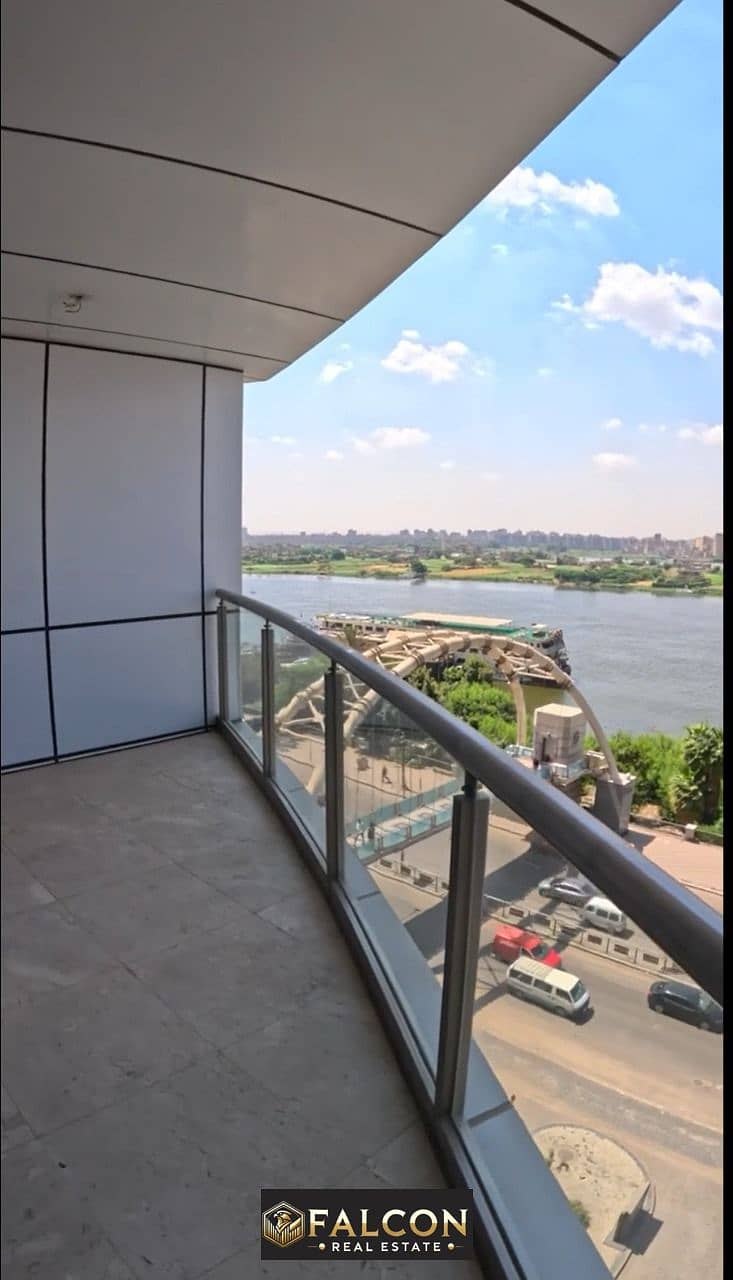 Ready to move luxury hotel apartment with full Nile River view for sale with installments on Maadi Corniche from Hilton Hotel in Nile Pearl Towers 0