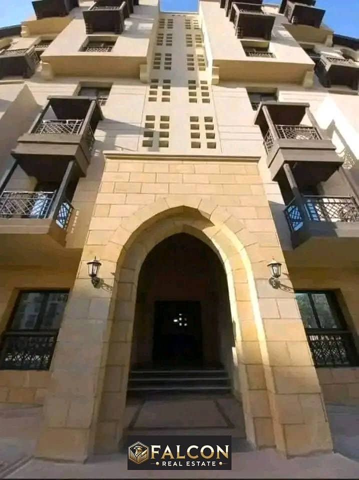 Two-bedroom apartment with a fantastic view and location, immediate delivery, for sale, High End finishing, in Fustat "Arabesque", with a 10% down pay 0