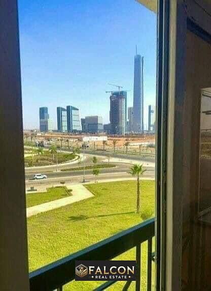 Double view of iconic tower and garden Ready To Move a finished apartment with installments up to 10 years in Al Maqsad Compound in New Capital 0