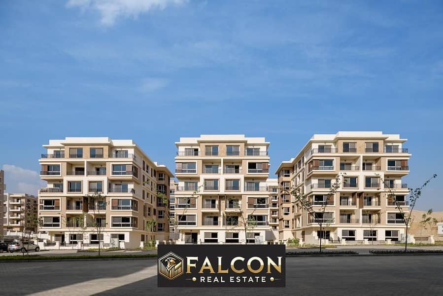 Apartment for sale with a cash discount of up to 50% in Taj City Compound in front of Cairo International Airport on Suez Road, a few minutes away fro 0