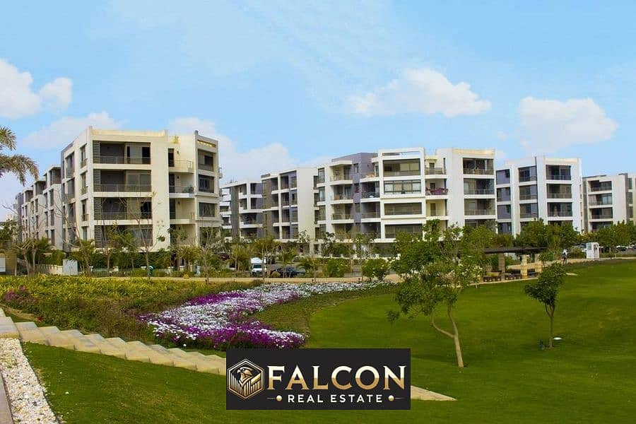 For sale, a 166 sqm apartment in the heart of the Fifth Settlement, next to Cairo International Airport, in the Taj City Compound, directly on the Sue 0