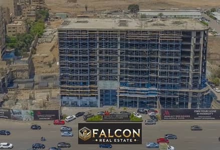 Hotel apartment, ready for delivery soon, with a 35% discount, fully finished, with Marriott hotel services, in a prime location on Al-Thawra Street i