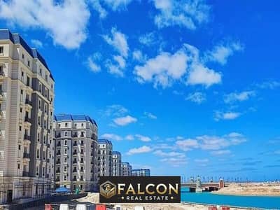 Fully finished apartment, immediate delivery, first row of lagoon, for sale in the Latin Quarter, New Alamein