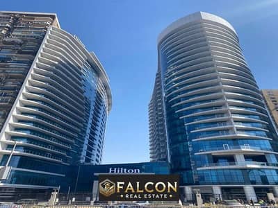 للبيع شقه بفيو بنورامي علي النيل استلام فوري + تشطيب فندقي تحت اشراف فندق هيلتون  (Service by Hilton)