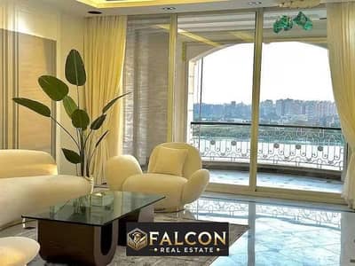 Hilton Hotel Management, immediate delivery apartment, fully finished, panoramic view of the Nile Corniche, directly on the Nile Pearl Towers