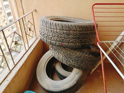 4 فردة طقم كاوتش عريض 285/60R/18 بحالة جيدة