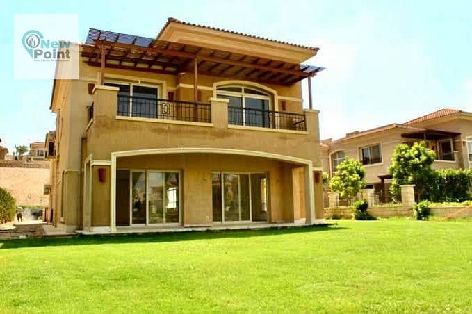 Standalone villa for sale in Stone Park Compound on the European plane directly on the ring road  Stone Park New Cairo compound 0