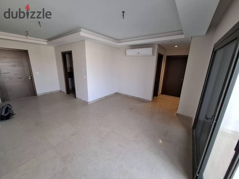 semi furnished apartment in zed west 0