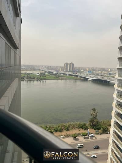 For sale, receive now, a 123-square-meter hotel apartment directly on the Nile, with luxurious finishing and air conditioning, Nile Pearl Towers, Maad