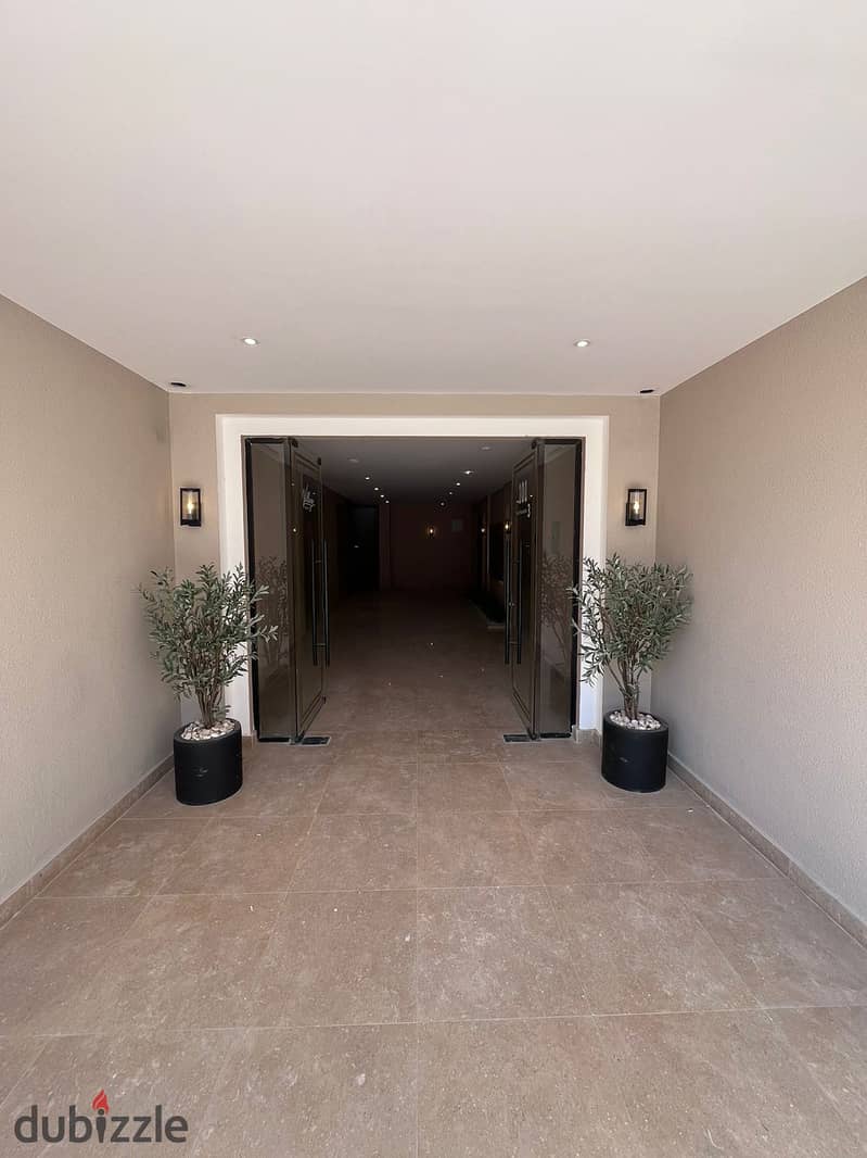 town house for sale in village west with payment facilities 15 min from mall of arabia 0