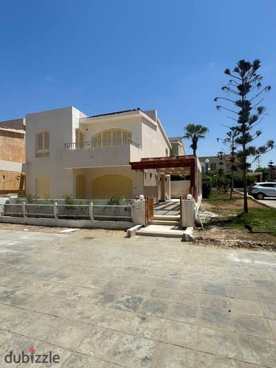 Independent two-storey villa for sale with a wonderful sea view, third row from the sea, in Montazah Village, K71, in installments!