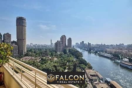 For sale, a 47 sqm hotel apartment in the Rive du Nile Towers, first row on the Nile, fully finished, with air conditioners, furnishings + appliances