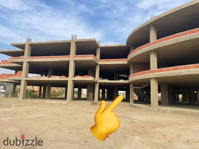 A fully finished store for sale inside Voke Mall, in installments, available for inspection in the Fifth Settlement, on Sadat Axis, at the intersectio