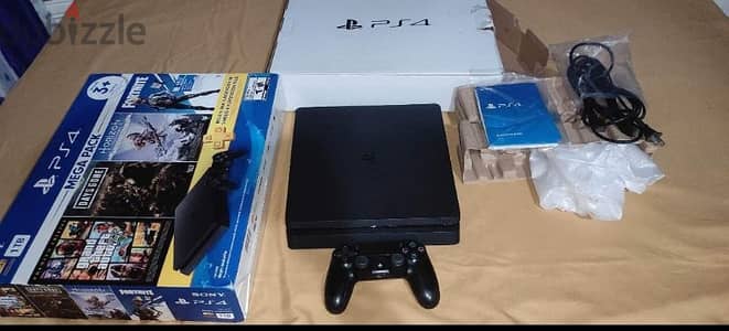 PS4 slim 1000 giga  استخدام منزلي بالكرتونة