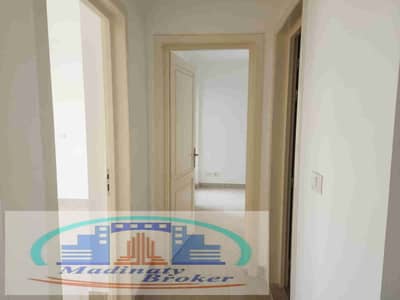 At a commercial price for a quick sale, a 70-meter apartment for sale ((cash)) in Madinaty B12, in front of the Craft Zone and East Hub Mall