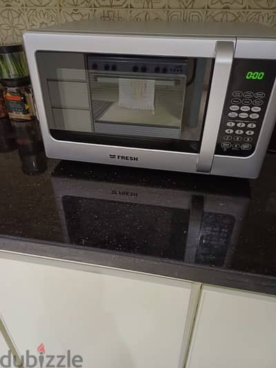 fresh microwave 25 liters very slightly used