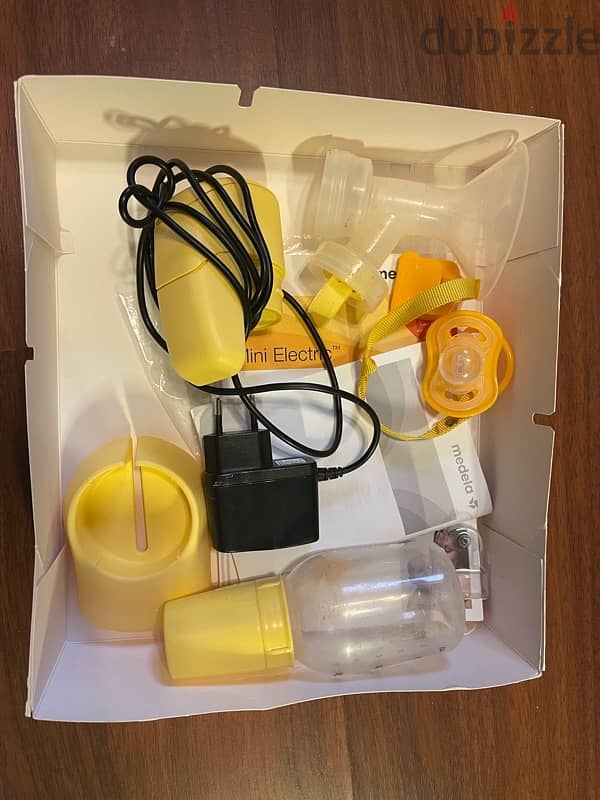 electric breast pump medele استخدام بسيط جدا 3