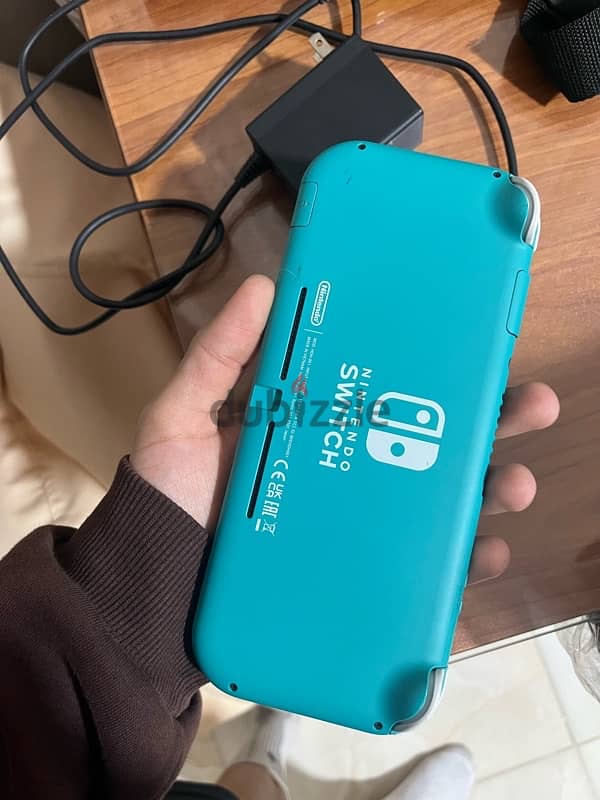 Nintendo Switch + original fifa 24 euro edition + original charger 0