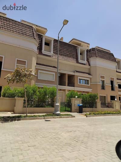 In installments over 12 years a townhouse villa for sale next to Madinaty on the Suez Road and Al Amal Direct axis in New Cairo New Cairo