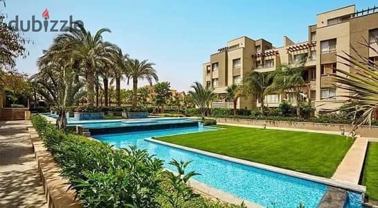 Apartment for sale with a private garden in installments, with a very special view of the landscape on the Suez Road in the Ammad Compound, Rehab City